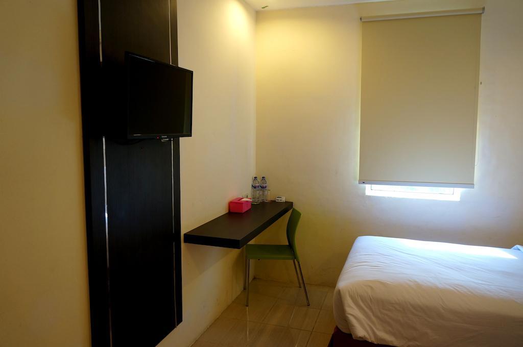 Quin Centro Hotel Palembang Rum bild