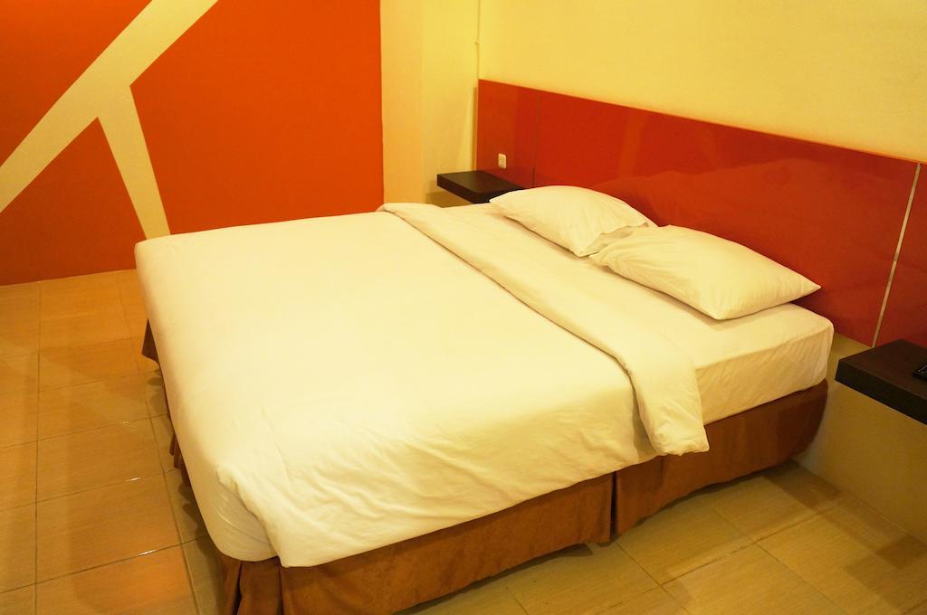 Quin Centro Hotel Palembang Rum bild