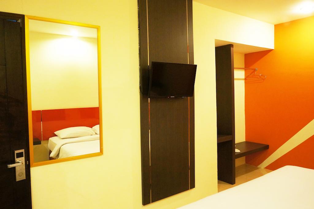Quin Centro Hotel Palembang Rum bild