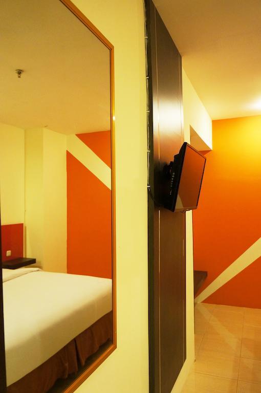 Quin Centro Hotel Palembang Rum bild