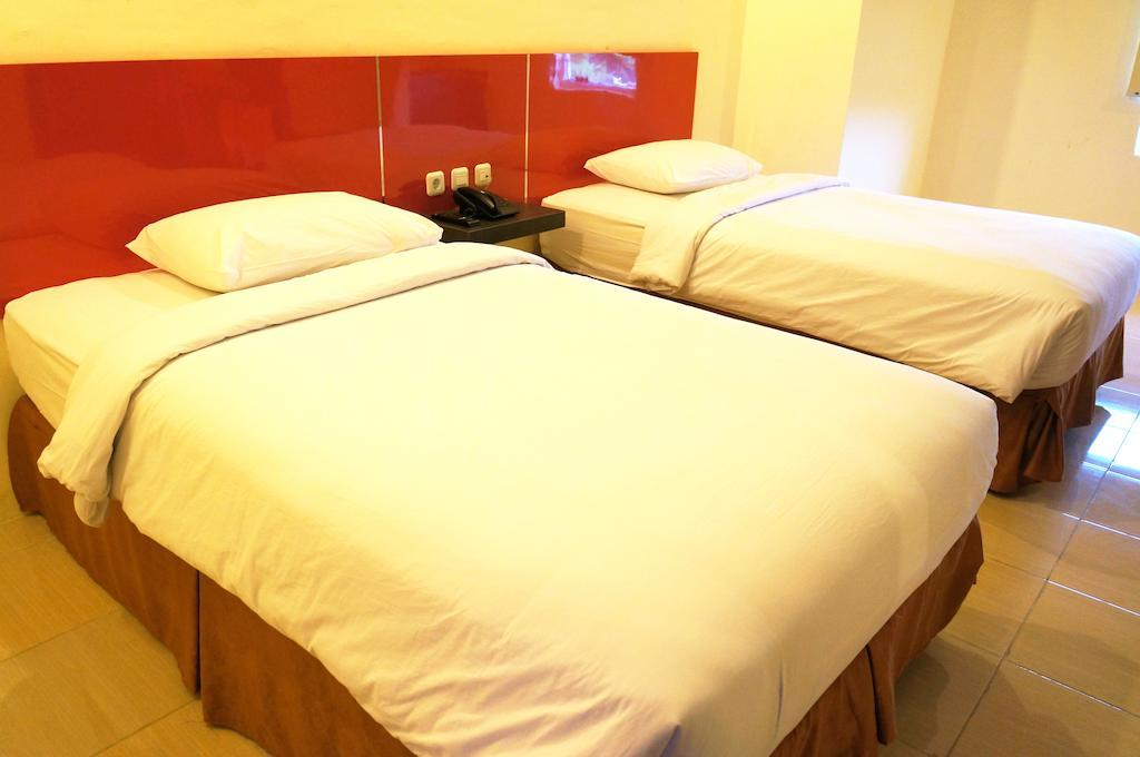 Quin Centro Hotel Palembang Rum bild