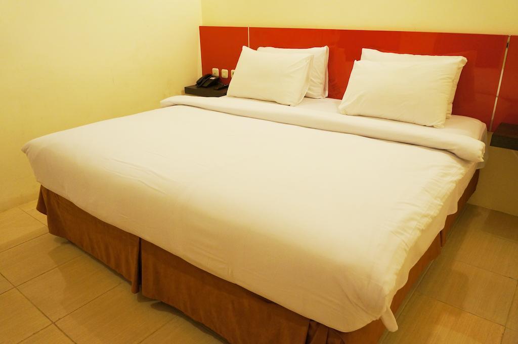 Quin Centro Hotel Palembang Rum bild